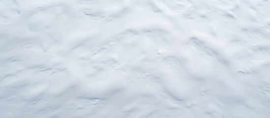 Obraz premium Fine snow texture background for winter scenes showcasing a smooth, pristine surface ideal for seasonal themes and designs.