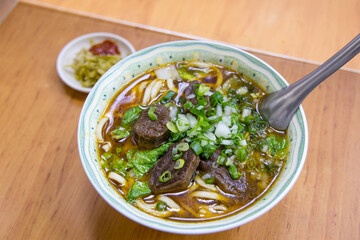 Delicious bowl of Taiwan beef noodle soup served hot