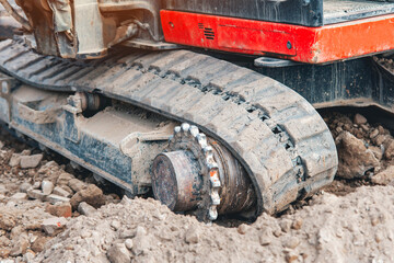 Excavator lost broken track and waiting for repair