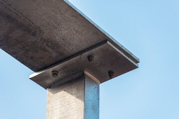 New steel beam installation at construction site showcasing structural support details