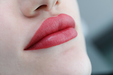 Permanent Make-up on her Lips. Permanent lip makeup completes the lip makeup procedure with a close-up