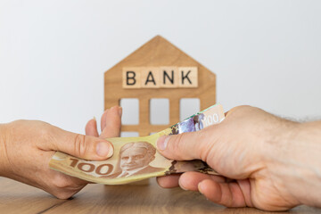 Canadian money. Bank loan in Canadian dollars. Financial business concept. Bank symbol, handing...