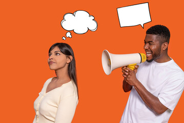 Engaging conversation between two individuals with one using a megaphone indoors