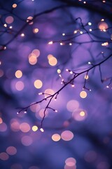A tree branch decorated with colorful string lights, ideal for outdoor events or holiday decorations