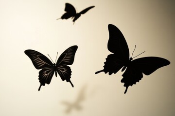 Obraz premium A group of colorful butterflies fly through the air, their wings fluttering as they go