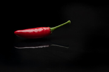 Red pepper isolated on black background, Spicy, food blog, food concept