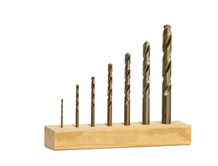 Drill bits of different sizes set on isolated white background