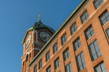 Iconic Ayer Mill clock tower and nineteenth century brick mill building in the historic immigrant...