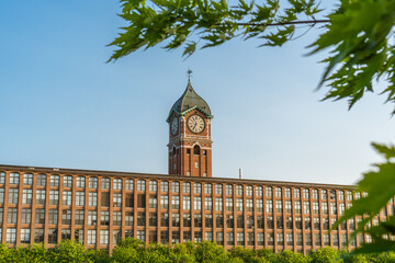 Iconic Ayer Mill clock tower and nineteenth century brick mill building in the historic immigrant...
