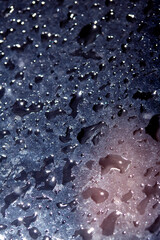 Close Up of Rain Drop Bubble Water on Glass Metal Background with Condensation