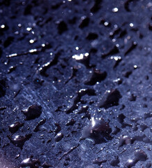 Close Up of Rain Drop Bubble Water on Glass Metal Background with Condensation