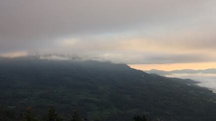 Natural landscape with fog and clouds in the morning