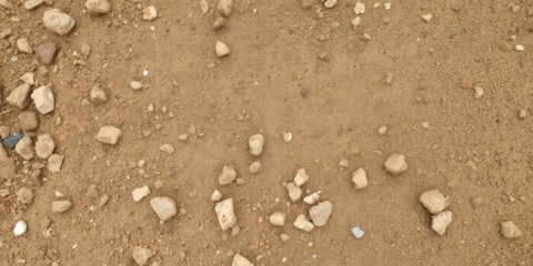 Close-up of rough and gritty texture of dirt background with small stones and debris scattered, debris