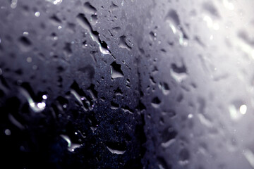 Close Up of Rain Drop Bubble Water on Glass Metal Background with Condensation