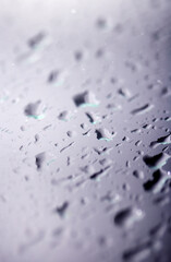 Close Up of Rain Drop Bubble Water on Glass Metal Background with Condensation