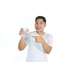 Handsome asian man white shirt hold glass of water gentle smile isolated