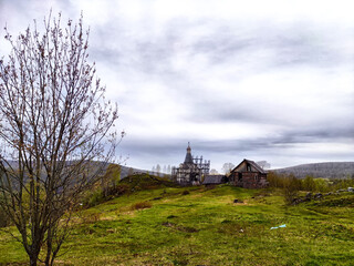 Fototapeta premium Old wooden houses at the filming location of the film The Heart of Parma in Russia in the Perm region