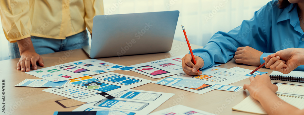 Poster panorama banner of startup company employee planning on user interface prototype for mobile applicat