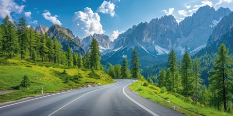 Serene Mountain Road Winding Through Verdant Landscape