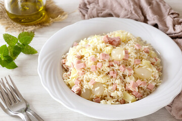 Italian Style Rice Salad on a white dish and light background