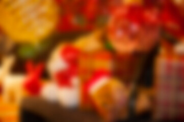 Defocused abstraction. Blur Xmas backdrop. Abstract unfocus background with Christmas mood. Defocused blur color. Xmas winter holiday. Happy new 2025 year. Blurred Christmas background. Xmas sale