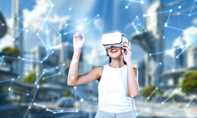 Female stand wear white VR headset and white sleeveless connect metaverse, future technology create...