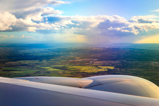 rain cloud and flying airplain