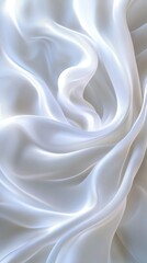 Obraz premium Delicate white satin fabric draped with soft folds, creating a serene and elegant texture.