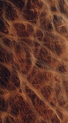 Obraz premium Close-up of intricate brown leather texture showcasing distinct natural patterns and rich tones.
