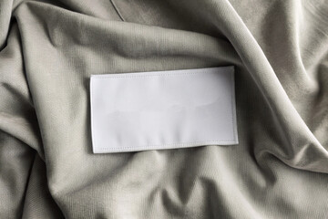 Blank white laundry care clothes label on  texture background generative ai