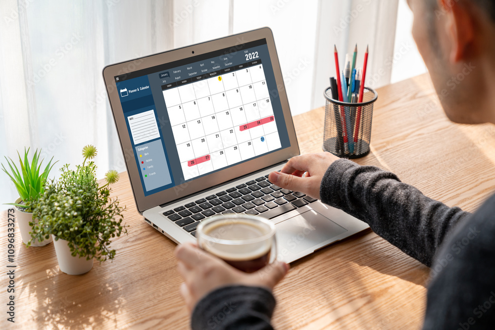 Poster calendar on computer software application for modish schedule planning for personal organizer and on
