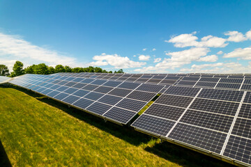 Solar power cells panels at power station in the field aerial. Green energy and ecology innovation for preservation of nature and avoid environment impact. Photovoltaic solar panels technologies