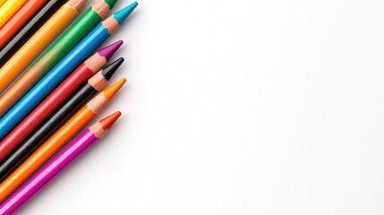 Fototapeta premium Colorful Drawing Tools Arranged Neatly on a Bright White Surface, Perfect for Creative Projects or Artistic Activities for All Age Groups