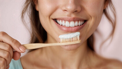 A woman brushes her teeth with a toothbrush and toothpaste. Teeth, health, dental care. Dentistry