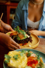 person eating breakfast