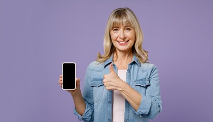 Naklejka premium close up of woman with cell phone on purple background