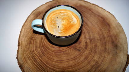 Cup of coffee on the wood background . High quality photo