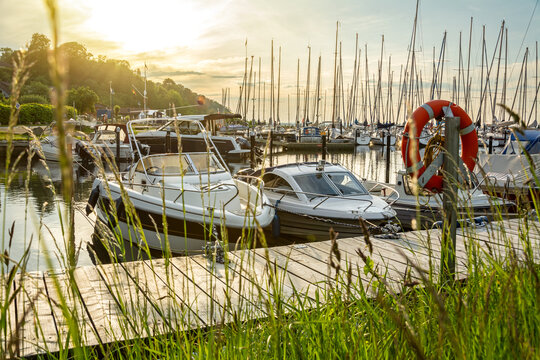 Sunset over pier and marina in Langballigau at the Baltic Sea in Northern Germany