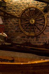 Wooden ship's wheel in wall