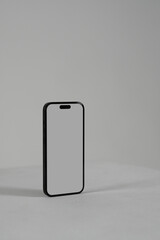 Minimal iPhone Mockup on a Light Grey Surface