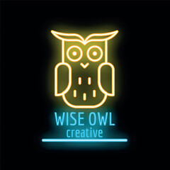 Yellow neon sign of a wise owl looking forward, on a black background