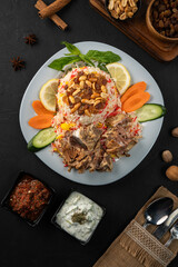 Traditional Arabic mandi dish with boiled lamb