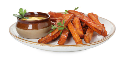 Delicious sweet potato fries, parsley and sauce isolated on white