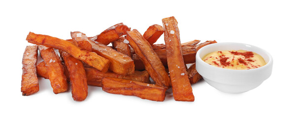 Delicious sweet potato fries and sauce isolated on white
