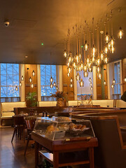 A large kitchen with a table and chairs