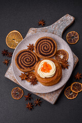 Sweet dessert danish covered with white cream and citrus, with cream filling