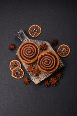 Freshly baked cinnamon roll with spices and cocoa filling