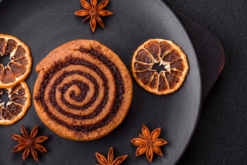 Freshly baked cinnamon roll with spices and cocoa filling