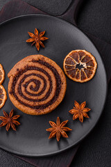 Freshly baked cinnamon roll with spices and cocoa filling