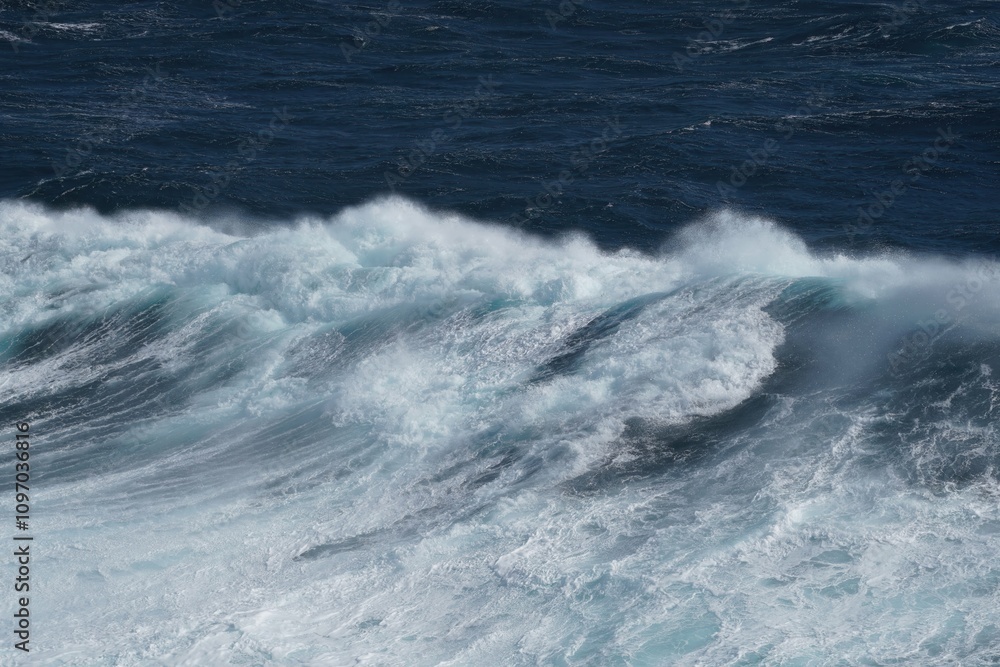 Poster majestic ocean waves crashing against each other, creating dynamic seascape. powerful movement and f